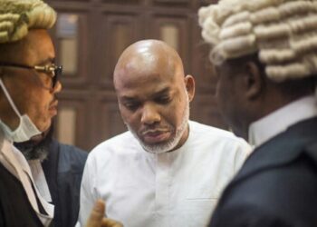 Nnamdi Kanu life sentence court gavel and Nigerian flag background.
