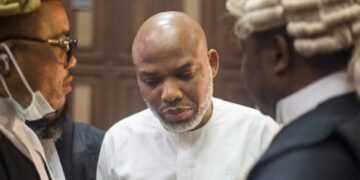 Nnamdi Kanu life sentence court gavel and Nigerian flag background.
